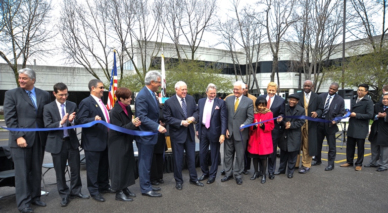 Cutting the ribbon.