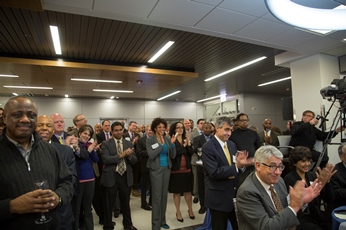 Visitors and staff gathered to hear remarks and learn about the new facility.