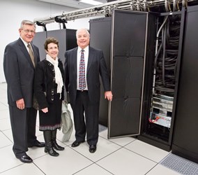 University of Illinois Trustees Ed McMillan and Karen Hasara toured the petascale facility with Blue Waters Project Director Bill Kramer.