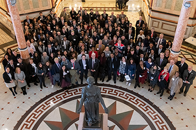 Group photo of visitors in the Capitol