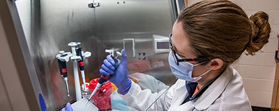 researcher processing test in lab