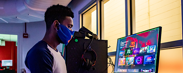 student working on colorful computer