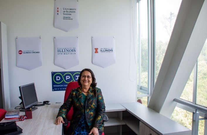 A person sitting in a chair in an office